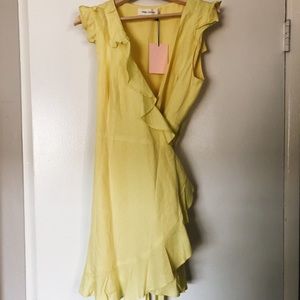 Fame & Partners yellow wrap mini dress
